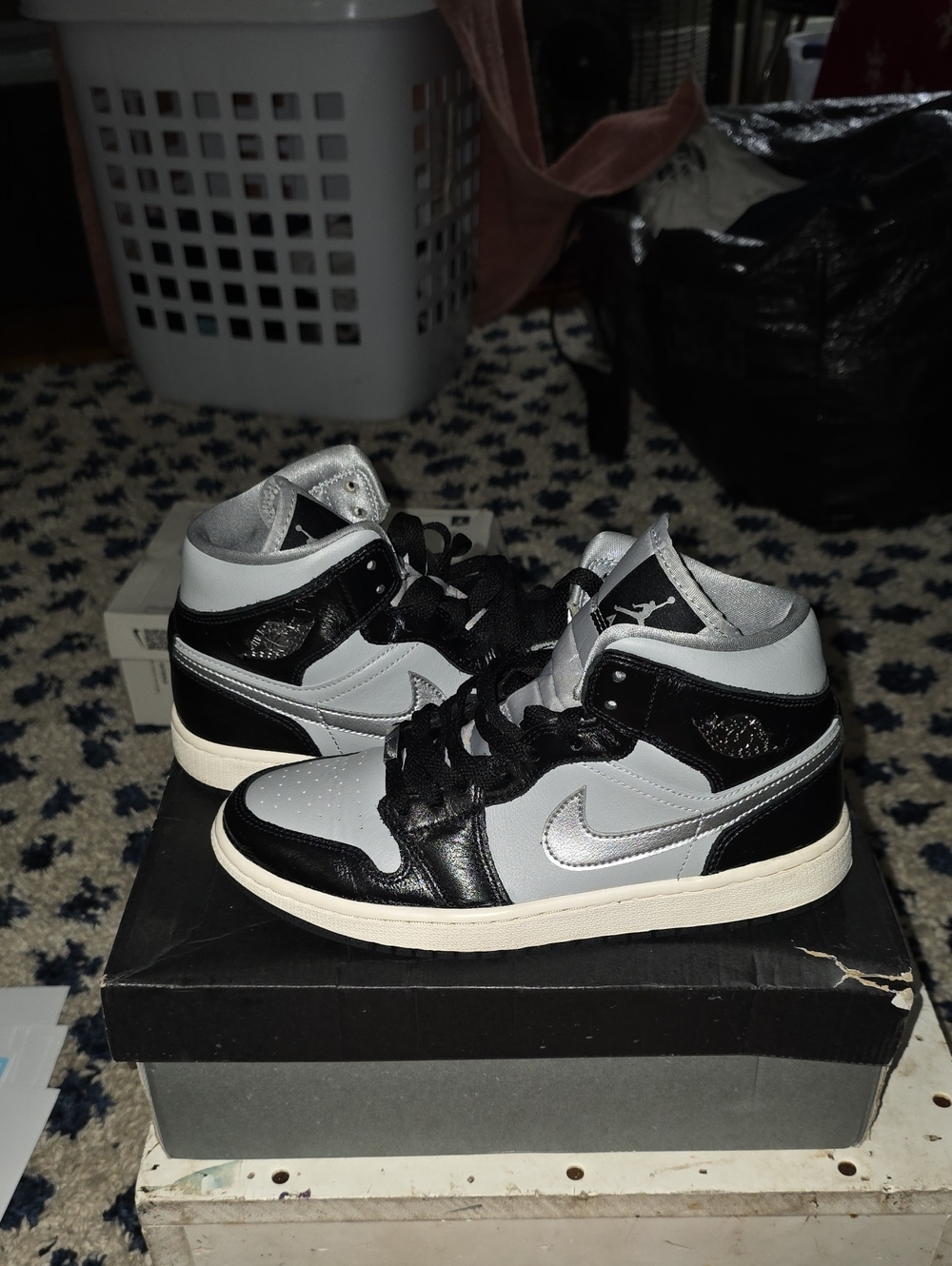 These are the women's Air Jordan 1 Mid SE "Black Chrome"